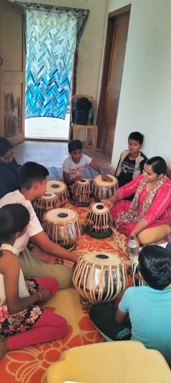 A group tabla practice session
